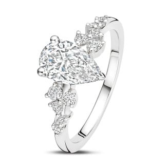 1.20 karat beyaz altın solitaire küme yüzük. armut kesim pırlanta