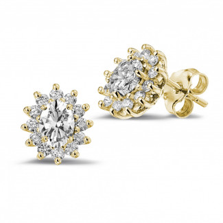 1.75 karat oval ve yuvarlak pırlantalı sarı altın entourage küpe