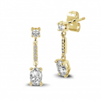 1.04 karat oval pırlantalı sarı altın küpe